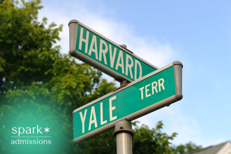 Street signs labeled Harvard and Yale symbolizing Ivy League college admissions, elite university choices, and the decision between top-ranked institutions.