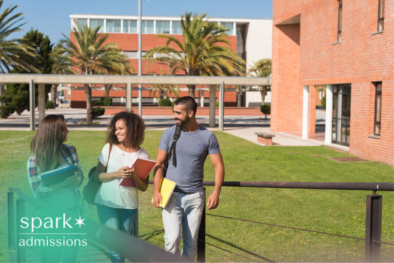 College students walking on campus with books