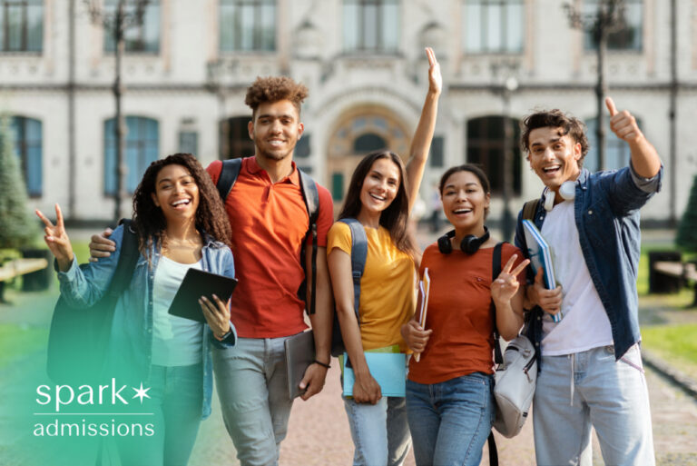 Diverse college students smiling together on campus