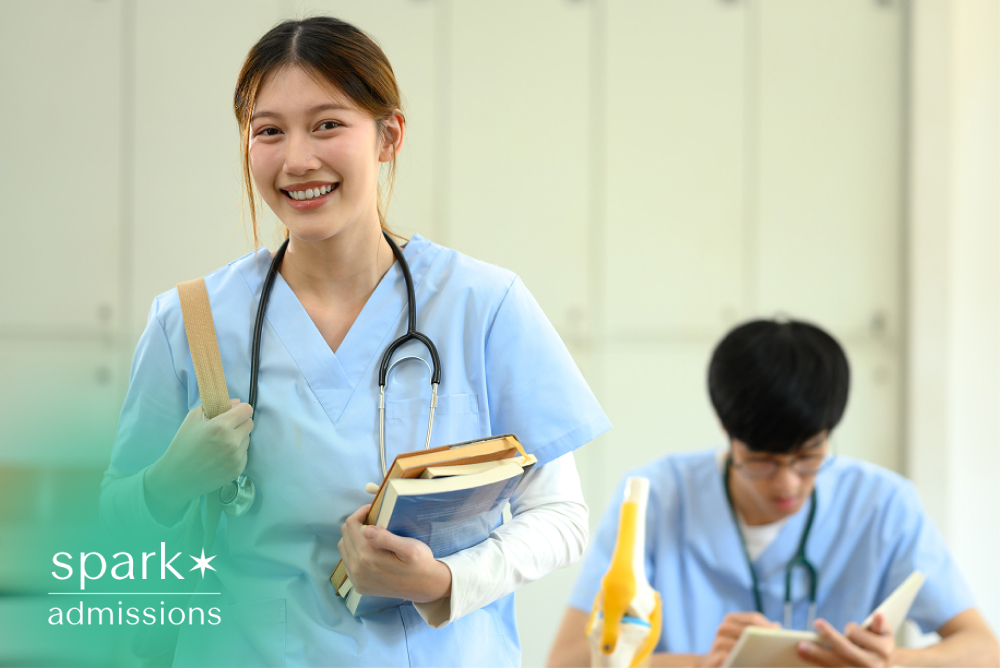 Nursing student holding books in a medical classroom