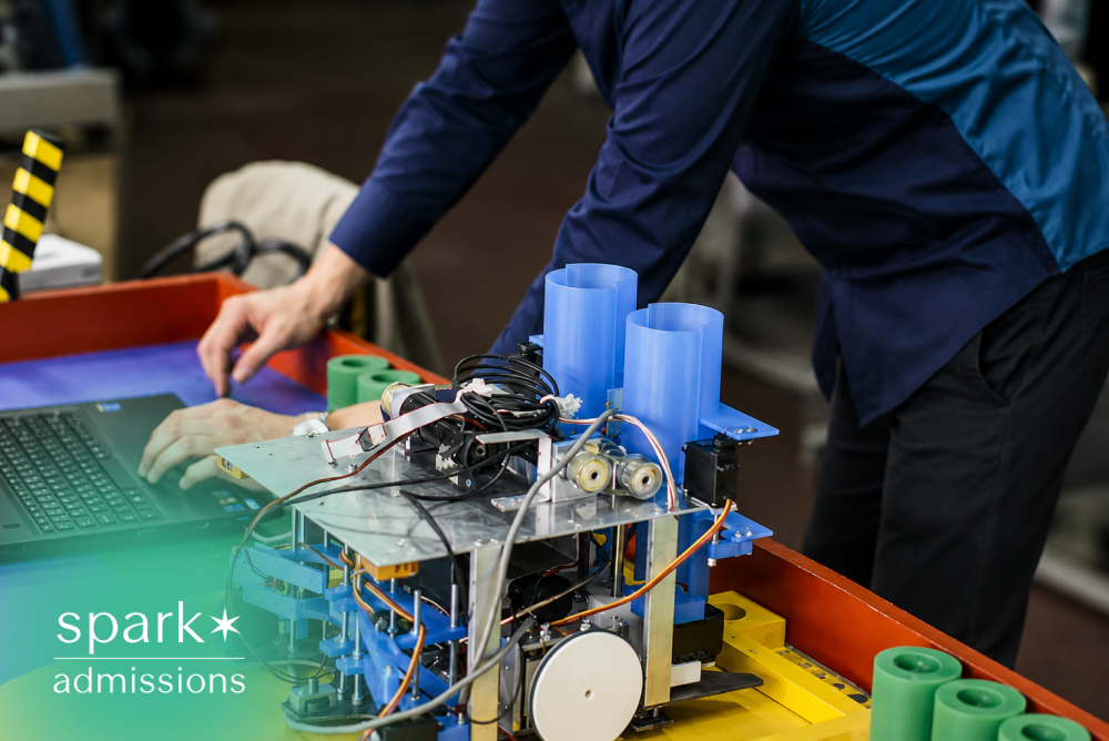 Student working on robotics project in a lab workstation