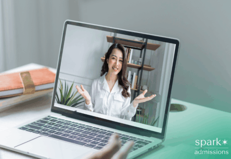 College applicant recording video introduction on laptop