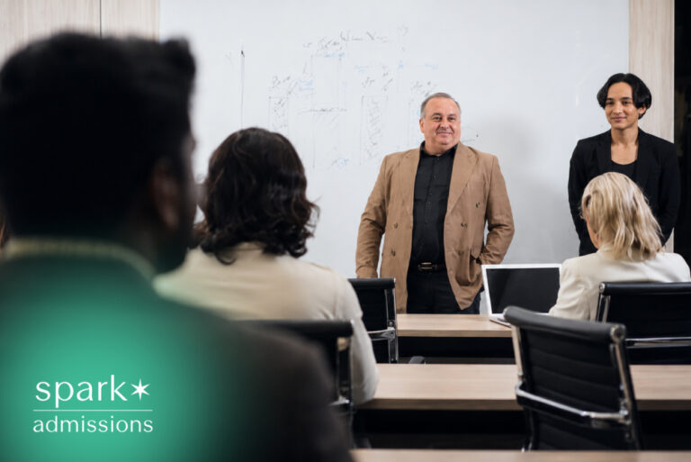 Professionals attending a classroom training presentation