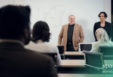 Portrait of a senior businessman giving a presentation to his colleague at office