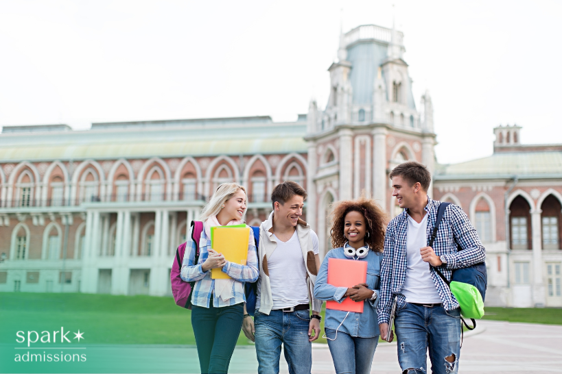 Group of students on campus exploring colleges that accept Glimpse.