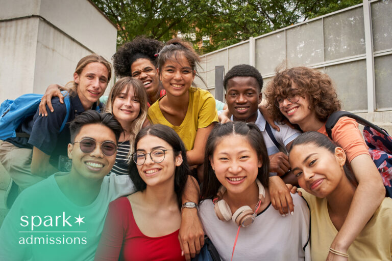 Diverse group of students smiling together on campus