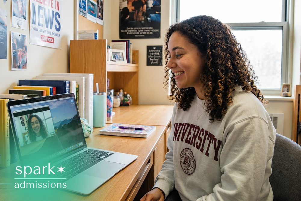 College student in dorm room attending a virtual admissions consultation