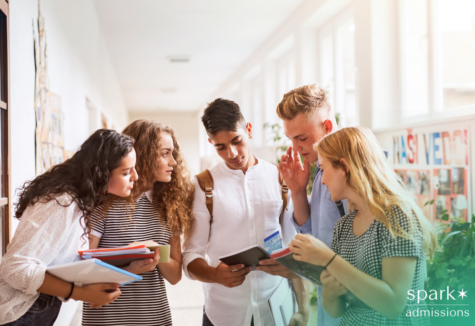 Group of five students in a bright school hallway reviewing notes together, holding notebooks and backpacks during a collaborative study discussion. File name: students-collaborating-school-hallway-study-group.png Thought for 17s Alt text: High school students work with a microscope in a science lab while a teacher guides them, highlighting hands-on STEM learning and mentorship. File name: students-science-lab-microscope-teacher-mentorship.png Thought for 20s Alt text: Two students work on a hands-on robotics/electronics project at a classroom table, connecting wires and components beside an open laptop. File name: students-building-robotics-electronics-project-classroom-laptop.png
