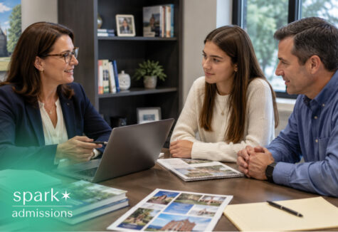 College admissions counselor meeting with student and parent in office setting