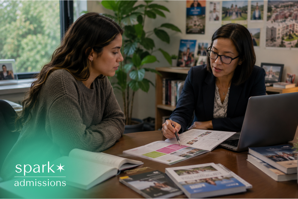 Student meeting with college advisor to review admissions materials