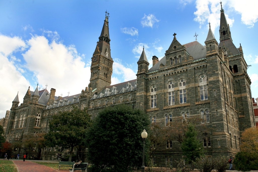 Georgetown University’s historic Healy Hall building on campus under a blue sky.