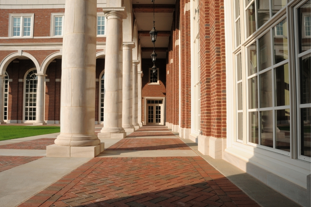 Tufts University campus walkway and academic building representing college admissions and student life.