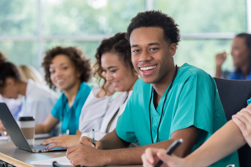 Pre-med students in a classroom representing college admissions consulting for aspiring medical school applicants.