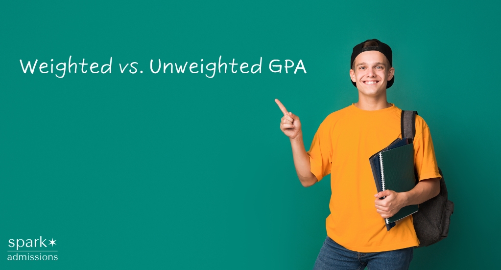 Student pointing to a board explaining the difference between weighted and unweighted GPA for college admissions.